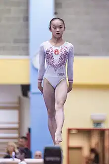 Zhou Yaqin performing a beam routine