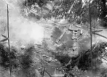 Black and white aerial photograph of buildings