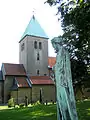 Gamle Aker kirke with  sculpture