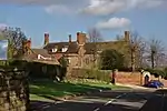 Netherseal Old Hall and attached outbuildings and garden walls