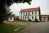 Two storey manor house.