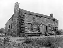 Old log home of Cephas Washburn at Norristown, still in use in 1930, when this photo was taken.