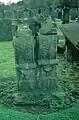 A tombstone made from carved stones taken from the old kirk