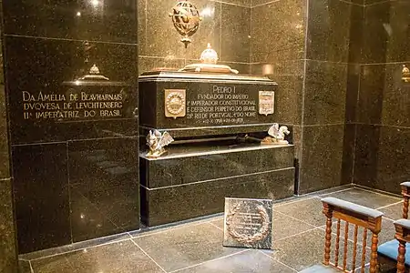 The graves of Emperor Pedro I of Brazil (also King of Portugal as Pedro IV) and his two wives Maria Leopoldina (not pictured, facing his grave) and Amélie (left), in the Monument to the Independence of Brazil, are made of green granite. The walls as well as the floor are clad with the same material.