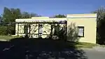 Single-storey Karoo-style flat-roofed building with stoep to front.
Type of site: Residence.
Current use: Museum.