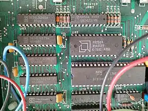 Mainboard. An AMD P8259A Programmable Interrupt Controller is visible, together with a NEC V20 (µPD70108) main processor (instead of an Intel 8088)