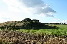 Two bowl barrows, one 380m west and one 685m north west of Beech Croft