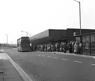 A bus loading passengers at Heworth, seen in May 1983.