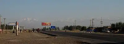 Outside of Aksu City with Tian Shan range