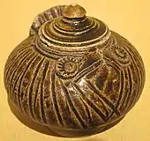 An owl-shaped lime pot; Angkorian era, 12th-13th century