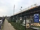 The bridge gradually descends between the Manchester Ship Canal and the Bridgewater Canal.