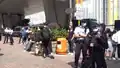 Police officers on guard outside the court