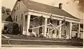 Tavern then named "The Old Tavern" being painted, circa 1940