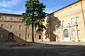 The inner courtyard of Honour with faded illusionistic perspective architecture and a Sea God with a Dolphin designed by Bernini