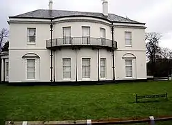 Parrs Wood House, a Grade II* listed Victorian building once belonging to the Parrs family, which houses the Sixth Form Centre