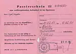 Pink slip of paper with the heading "Passierschein III zum vorübergehenden Aufenthalt in der Sperrzone"