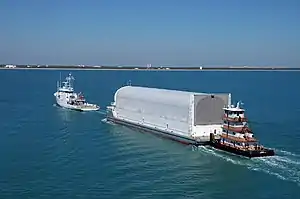 Deck barge carrying the Space Shuttle external tank for STS-119 under tow to Port Canaveral, Florida, United States