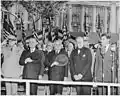 President Dutra and U.S. President Harry S. Truman standing at attention with other dignitaries during welcoming ceremonies for Dutra in Washington, D.C., on May 18.