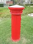 This pillar box, as situated above, belongs to one of the earliest documented British made post boxes, the fluted type supplied in 1857. This was one of 19 distinct types of pillar boxes supplied to the British post office in the period, 1852 to 1859. Type of site: Post Box, Railway Station. This pillar box, belongs to one of the earliest documented British made post boxes, the fluted type supplied in 1857.