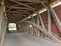 The inside of the bridge showing the Burr arch truss