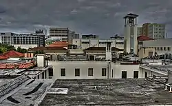 Polytechnic University of Puerto Rico and the Milla de Oro in the background.