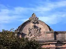 Spanish coat of arms at the top of the building