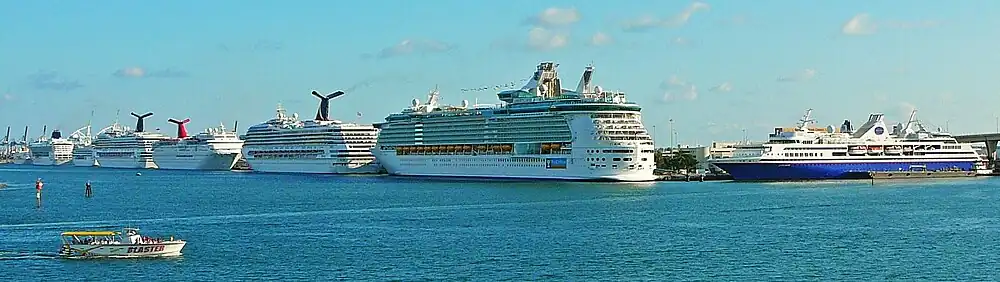 PortMiami is the world's busiest cruise ship port and is headquarters to many of the world's largest cruise companies. From left to right: Hapag-Lloyd Europa, Norwegian Sky, Oceania Nautica, Carnival Valor, Carnival Imagination, Carnival Liberty, Royal Caribbean Liberty of the Seas, MV Explorer