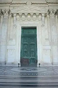 One of the massive neoclassical doors