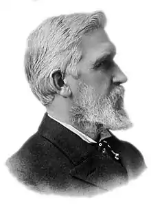 Elisha Gray, 1876, designed a telephone using a water microphone in Highland Park, Illinois.