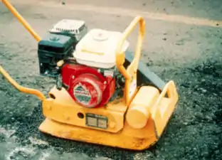 Semi-permanent pothole repair procedure—compaction using vibratory-plate compactor