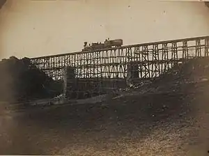 The bridge of 'cornstalks and beanpoles', a temporary trestle over the abutments.