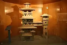 Ancient Chinese model of two residential towers, made of earthenware during the Han dynasty, 2nd century BC to 2nd century AD, excavated by archaeologists in 1993.