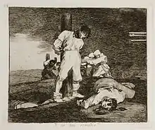 A blindfolded prisoner is tied to a stake, about to be shot by a firing squad. Another man lies dead nearby. In the distance, several prisoners are blindfolded and tied to stakes; they have all been shot and killed by firing squads.