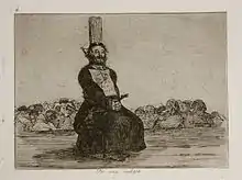 A bearded man in clerical vestments tied to a stake on a platform. He is squatting and his hands are bound. In the background is a large group of people, standing below the platform, with indistinct faces.