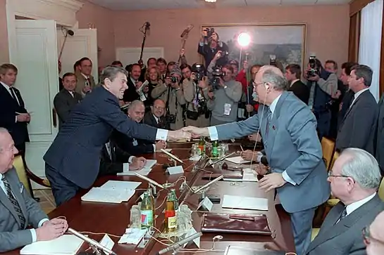 Geneva Summit, with Matlock seated at the far end of the table