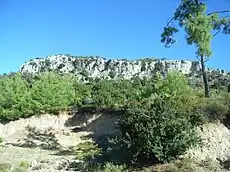 Fault-line cliff on Profitis Ilias. In the foreground are friable rocks of Middle Miocene-Pleistocene age.