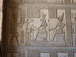 Ptolemy XII before Isis and Osiris, at the Hathor Temple, Dendera.