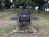 The cairn, installed in 2005 to commemorate the Auckland Regiment to the south of the central cone Pukekaroa.