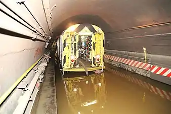 A pump train is seen removing water from the Cranberry Street Tube shortly after Hurricane Sandy. The water is brown in color.