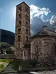 Stone church with a separate massive tower.