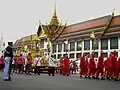 The officers on the Minor Chariot wear the Nobleman's Gown and the Lomphok. The Chariot is carrying The Most Reverend Somdet Phra Wannarat (Chun Phrommakhutto), the Abbot of Wat Bowonniwet Vihara, on 15 November 2008.