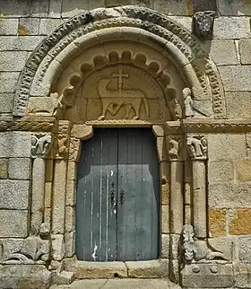 Lateral door of Rates Monastery with the Agnus Dei: the Lamb of God carrying a cross.