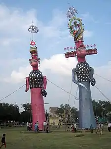 Giant puppets controlled by lines at a Dussehra festival, Jaipur, 2013