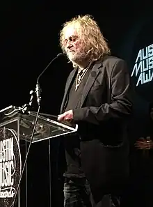 Hubbard receiving "Songwriter of the Year" award at 2018 Austin Music Awards