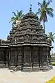 Star-shaped shrine with wall panel images and shikhara (superstructure)