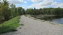 Gravel and earthen embankment