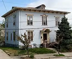 Photograph of a two-story, Italianate-style house