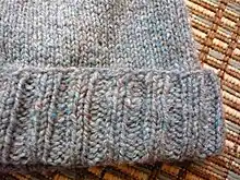 An example of knitted ribs, created by knitting and purling across the same row.