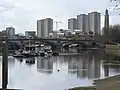 View from Chiswick, from right to left; Brentford Museum of Water and Steam pumping tower, Kew Bridge (Centre), River Thames, Brentford Towers, GSK building