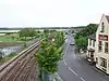 View from the modern road bridge which crosses the old road, railway and River  Test adjacent to the Anchor Hotel